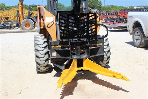 tree and post puller skid steer attachment rental|danuser intimidator tree puller.